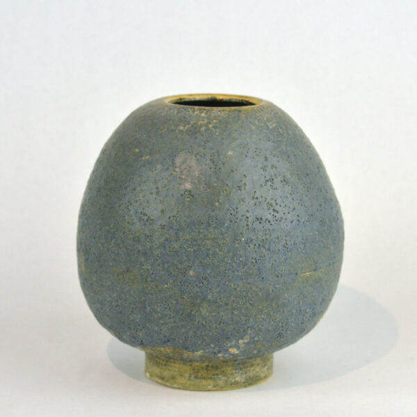 A modern, volcanic glaze vase.