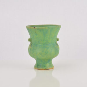 Unknown small urn shaped vase. Green and yellow matte glaze.