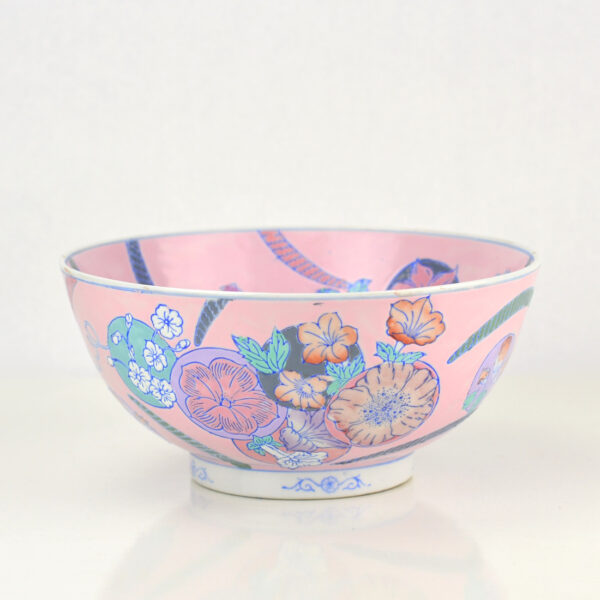 Pink enamel Chinese bowl with flower decorations side