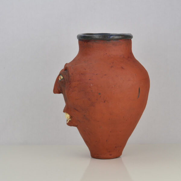 Face jug or vase made of terracotta profile