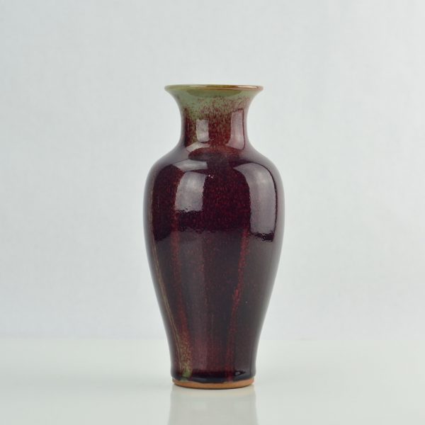 Ox blood celadon Chinese or possibly Southeast Asia vase. A baluster form vase
